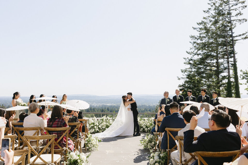 Elegant outdoor wedding ceremony setup with vineyard views in Portland, Oregon.
