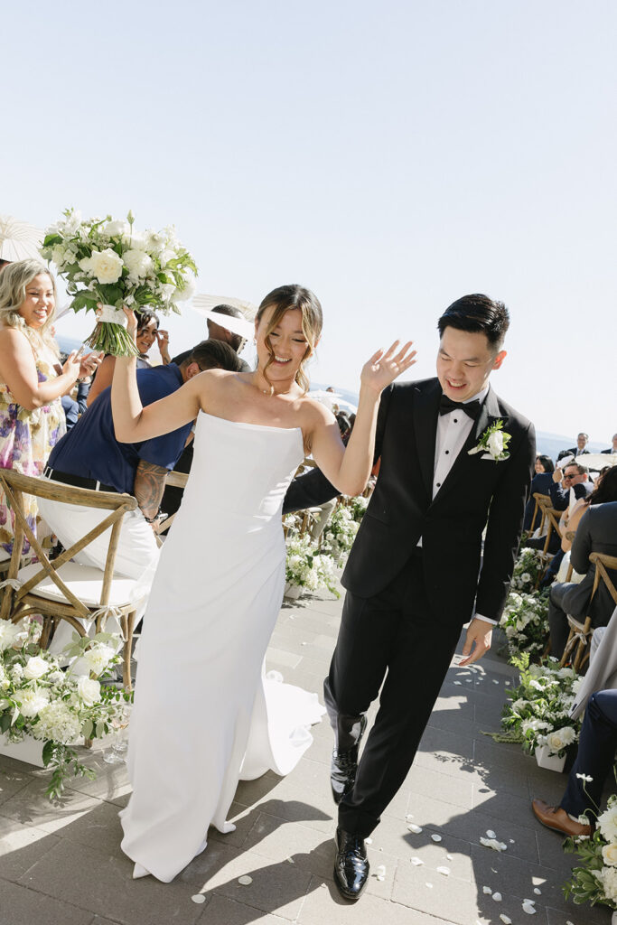 Elegant outdoor wedding ceremony setup with vineyard views in Portland, Oregon.
