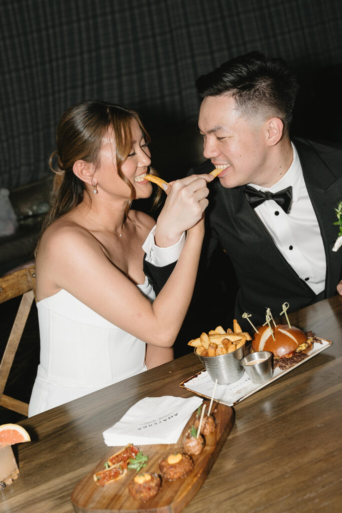 Timeless wedding reception design with neutral decor and glowing candlelight.
