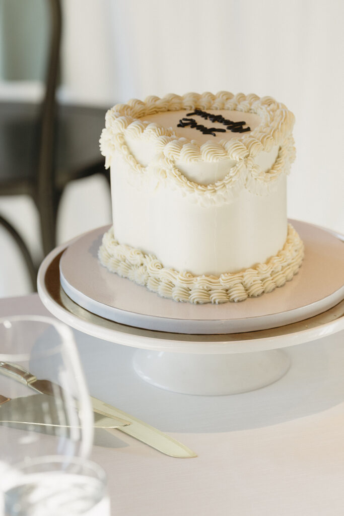 Timeless wedding reception design with neutral decor and glowing candlelight.
