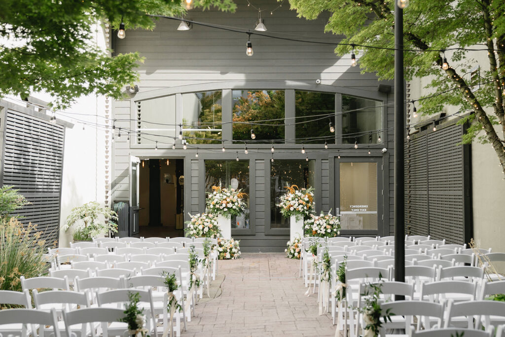 Non traditional wedding ceremony at Everett West in Portland filled with love and supportive guests
