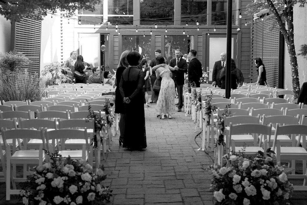 Non traditional wedding ceremony at Everett West in Portland filled with love and supportive guests
