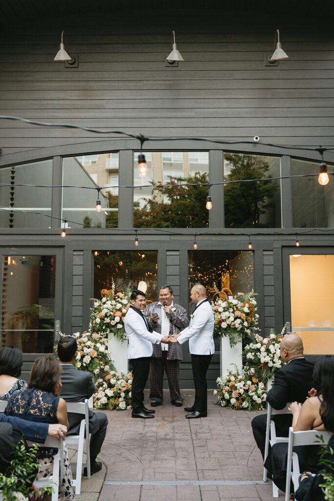 Non traditional wedding ceremony at Everett West in Portland filled with love and supportive guests
