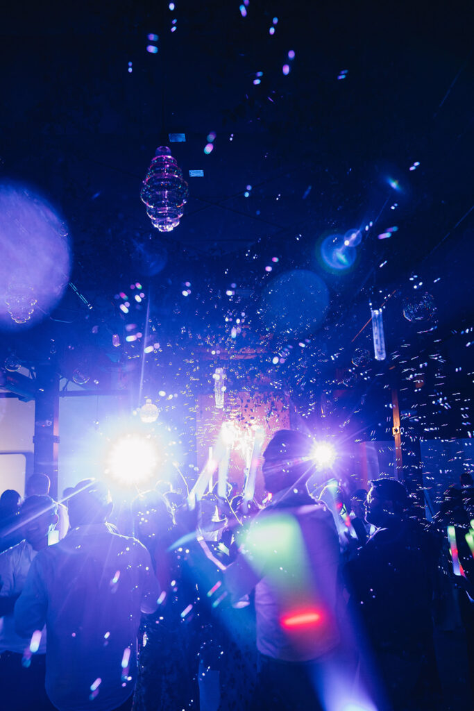 Lively wedding dance floor at Everett West during an inclusive city celebration
