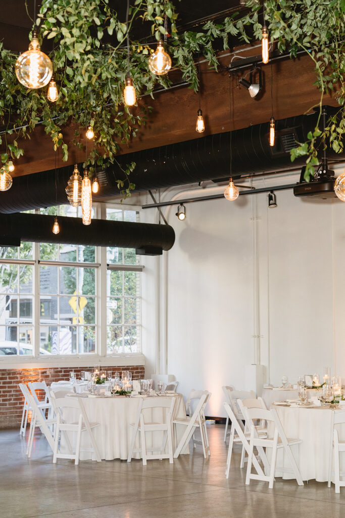 Romantic non traditional wedding reception in Portland with modern floral design
