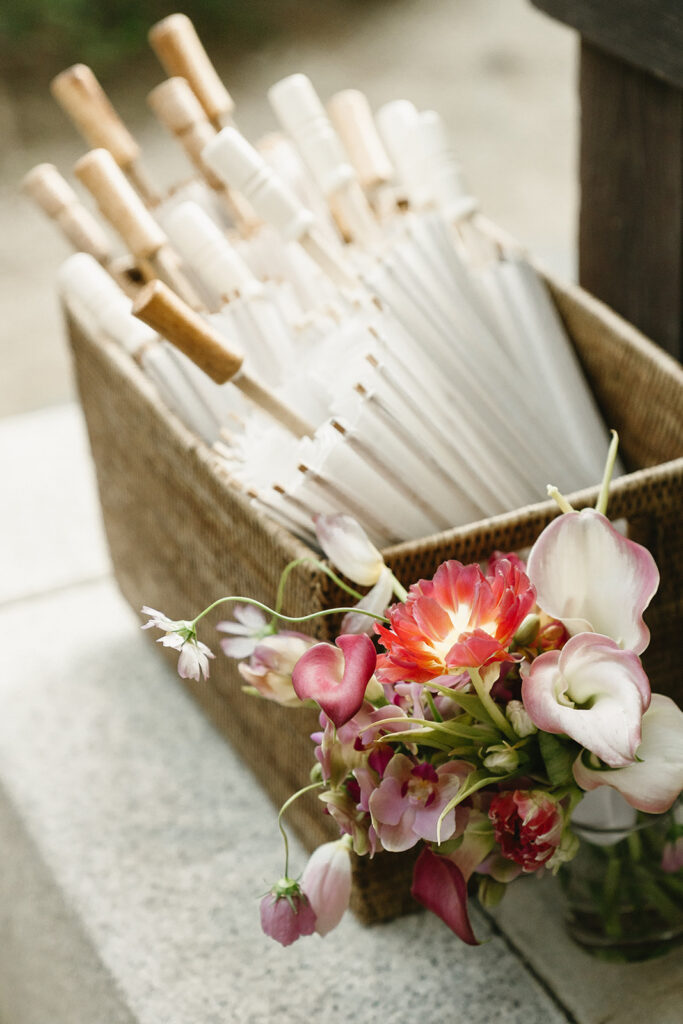 Intimate wedding in Seoul at Rakkojae Hanok with a small group of guests gathered in a traditional Korean courtyard.
