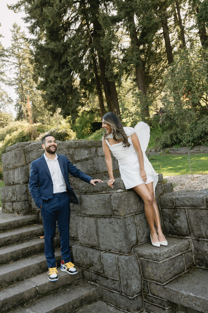 Modern civil union wedding photos at Washington Park featuring newly married couple laughing together outdoors
